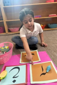Home child learning urdu letters